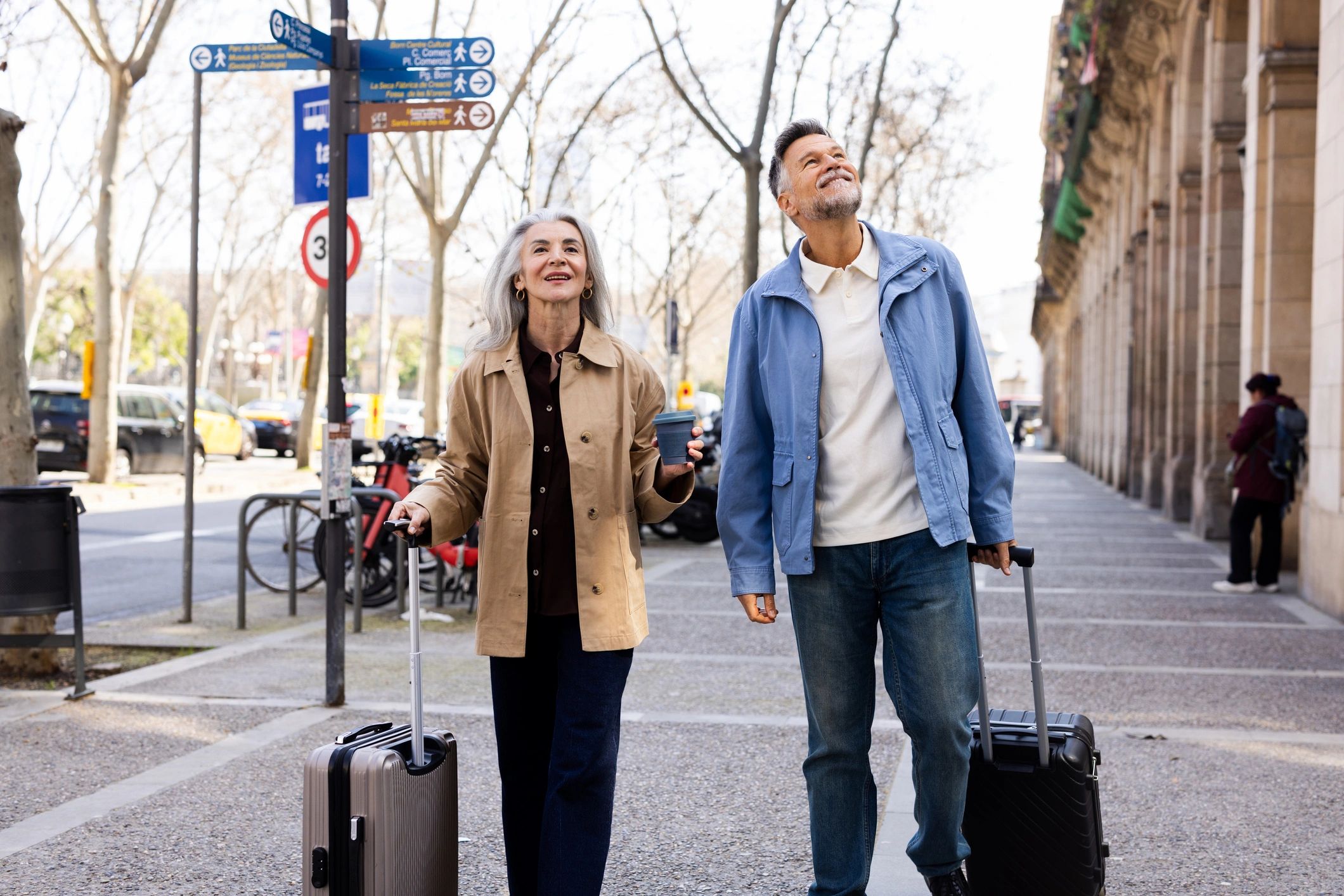 Companion walking with seniors outdoors